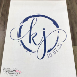 A captivating navy blue design unfolds like a splash of fluid water, shaped in a circle to cradle a simple and clean monogram. The hand-drawn features exhibit organic and jagged line work, creating an artistic and dynamic wedding aisle runner. Meticulously hand-painted, this design adds a touch of fluid elegance to your wedding decor. "KJ" wedding logo.