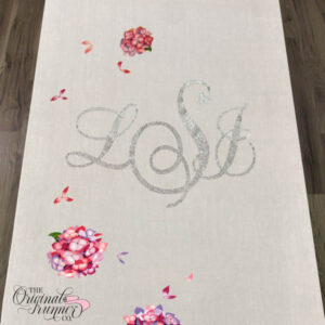Did you know hydrangea colors change with the soil's pH? Well, we bring that magic to your aisle runner! Choose your shades, and watch the enchantment unfold as our artists meticulously hand-paint florals matching your color scheme. It's the perfect addition to feature your names, initials, or wedding date. Don't forget to add stunning crystals to your monogram for that extra special touch.