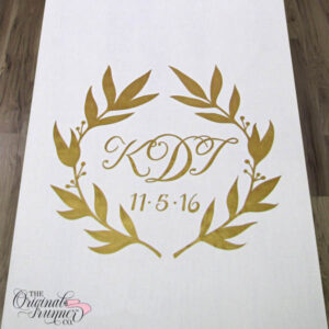 Elevate your wedding decor with a touch of elegance using this golden leafy wreath adorned with simple berry buds. The unfussy and stylized design is perfectly complemented by a calligraphy 3-letter monogram, creating a stunning and personalized addition to your aisle runner. "KDT" wedding logo.