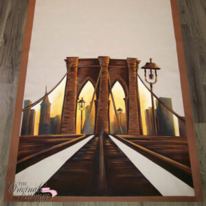 Celebrate your unique love story with a beautifully rendered Brooklyn Bridge at dusk, capturing the essence of your cherished moments. The warm yellow glow adds a romantic touch to this custom aisle runner, making it a perfect representation of the connection and love you share, especially when meeting on the iconic Brooklyn Bridge in separate New York boroughs.